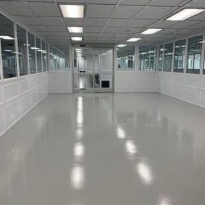 A clean room with white floors and walls.