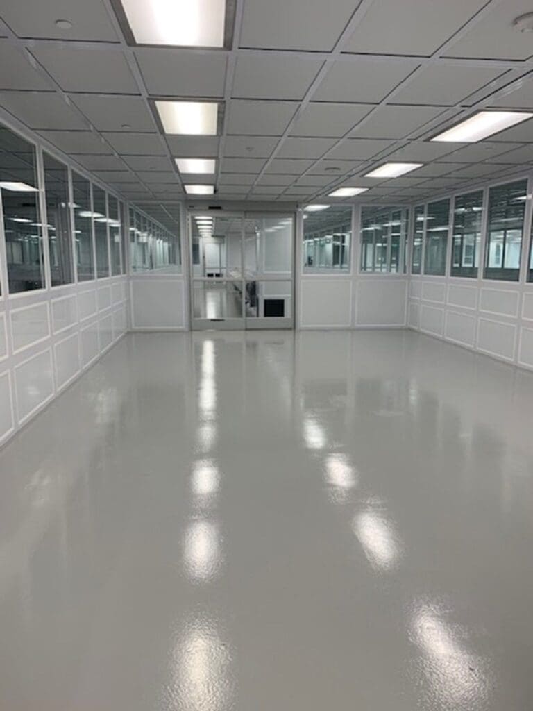 A clean room with white floors and walls.
